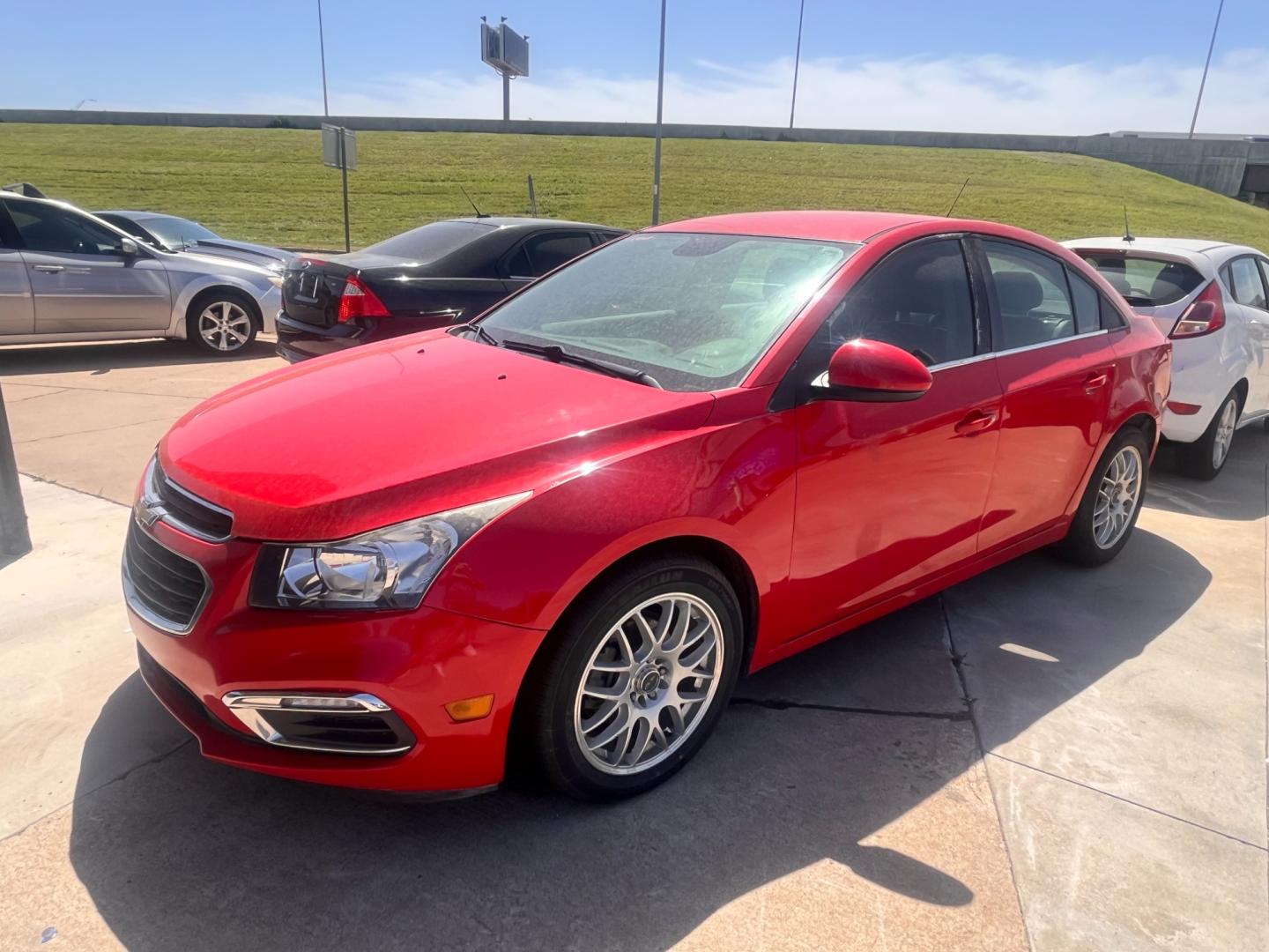 2016 RED CHEVROLET CRUZE LIMITED 2LT 2LT Manual (1G1PF5SB7G7) with an 1.4L L4 DOHC 16V TURBO engine, 6-Speed Manual transmission, located at 8101 E. Skelly Dr., Tulsa, OK, 74129, (918) 592-3593, 36.121891, -95.888802 - Photo#0